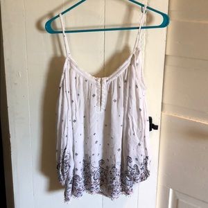 Urban Outfitter’s Ecoté white openshouldered shirt